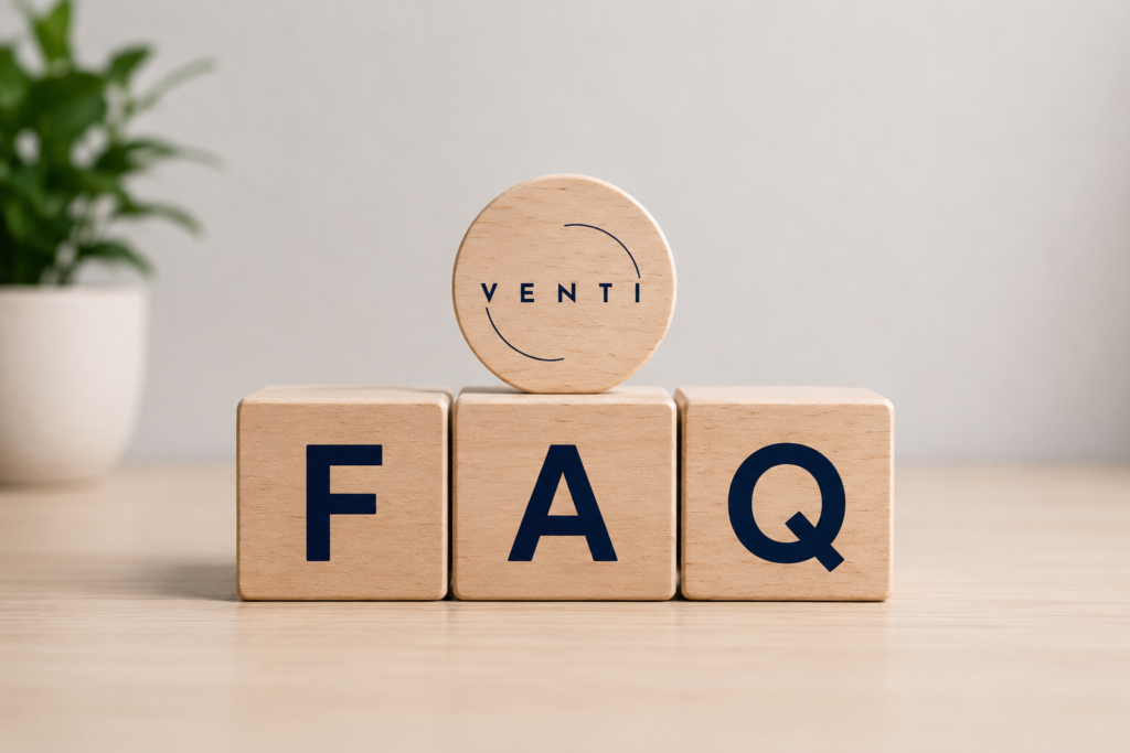Wooden FAQ letter blocks with Venti Hair Clinic logo coin on top, representing frequently asked questions about female hair transplant in Istanbul.